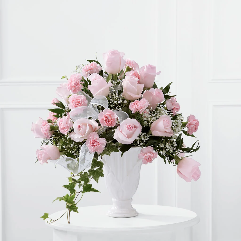 White sympathy flowers and funeral arrangements in Cheshire